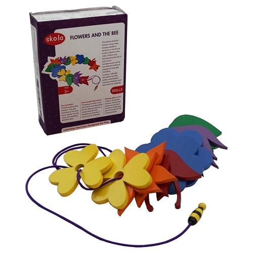 Skola Wooden Flowers and Bee Threading Toy: bee threads through wooden flowers for fine motor + sequencing, ages 3+