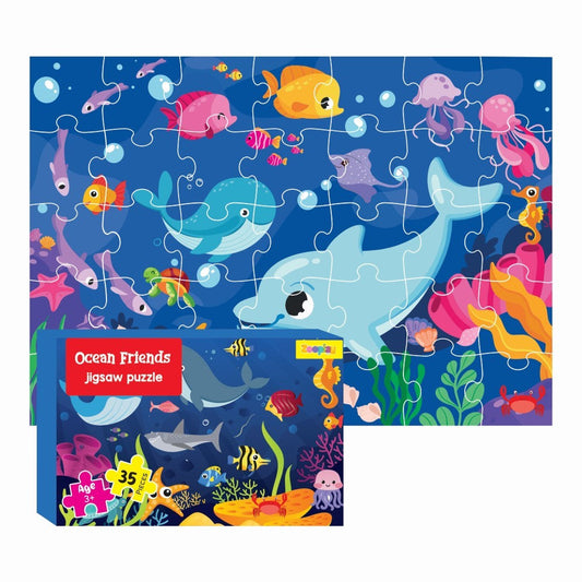 Child completing an Ocean Friends 35-piece jigsaw puzzle, showing various sea creatures like fish and octopus