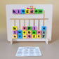 Child assembling words on an Advance Word Maker with cards