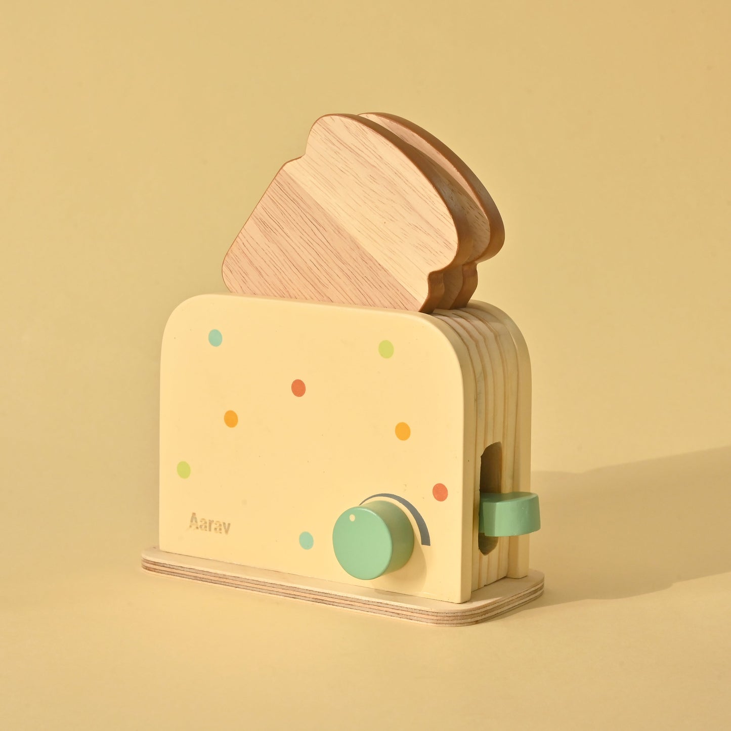 Educational pretend play kitchen toy for toddlers, featuring a pop-up toaster