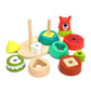 Toddler's hands actively stacking vibrant wooden rings onto the bear base