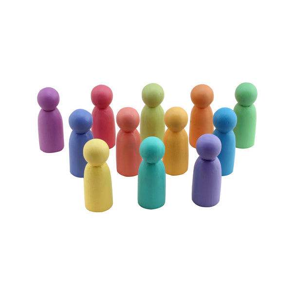 Casa Bambini Wooden Rainbow Dolls set of 12: chunky pastel beech-wood figures arranged in a rainbow